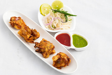 Indian Subcontinental Tea Time Chaat Snacks With Various Names Like Onion Bhajji Pyaj Pakora Or Pakore Punjabi Pyaaj Ke Pakode Or Pakoda Kanda Bhaji Pyaaz Bajji Is Mostly Enjoyed In Rainy Season