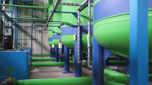 Green chemical tanks, huge barrels of chemicals, polyol containers