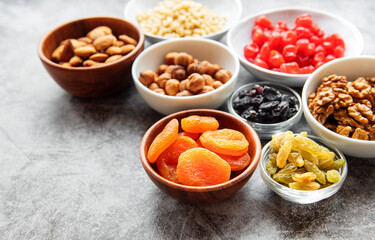 Bowls with various dried fruits and nuts