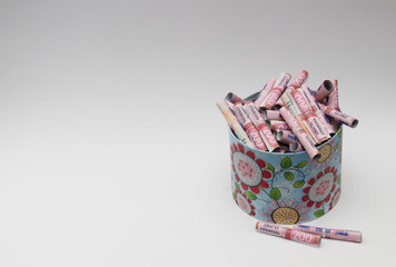 Gift box with ukrainian money. On a white with copy space.