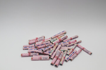 A pile of ukrainian money. 200 banknotes. Ukrainian money in a roll.