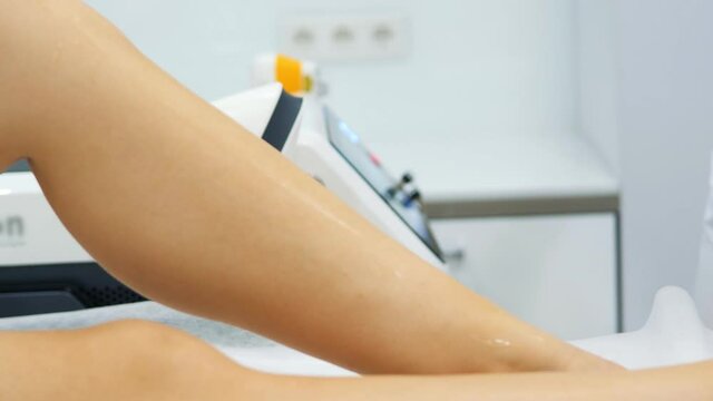 Laser epilation and cosmetology in beauty salon. Cosmetology, spa and hair removal concept