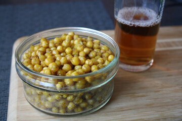 Roasted chickpeas with spices. Appetizer for drinks.