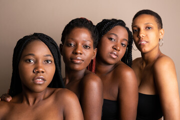 portrait of four beautiful young african women 