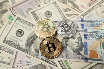 Bitcoin and dollar coins, USD with BTC coins, digital currency in contrast to fiat money.