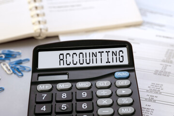 Calculator with the word accounting on the display