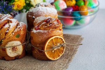 Easter cake Kraffin (Cruffin), with nuts and candied fruit sprinkled with powdered sugar, 2021 trend of the easter cake.
