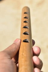 All of our handmade flutes are transverse flutes; this means that they are side blown flutes, played similar to a concert metal flute.