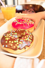 Dessert donut on a plate in a cafe