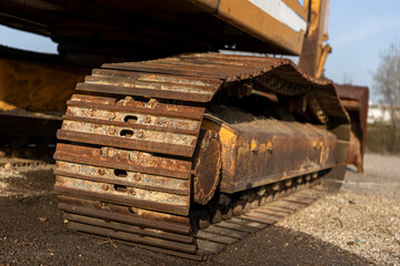 Fototapeta na wymiar Excavator bogies or wheels.Heavy machinery at construction site