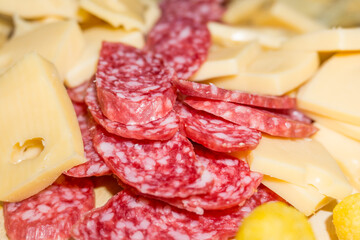 Salad appetizers, cheese and salame
