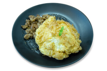 Fried pork with garlic and pepper and omelet over rice topping on white background.