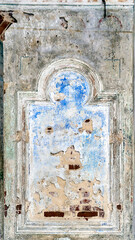 the remains of a painting inside an abandoned church