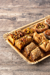 Assortment of Ramadan dessert baklava on wooden table