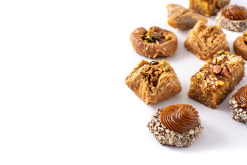 Assortment of Ramadan dessert baklava and dates isolated on white background. Copy space
