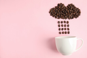Cloud and raindrops made of coffee beans falling into cup on pink background, flat lay. Space for text
