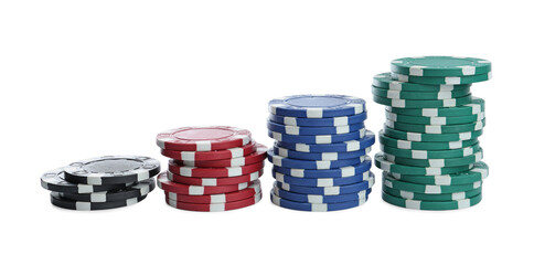 Plastic casino chips stacked on white background. Poker game