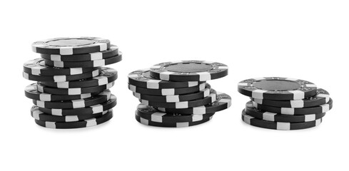 Stacks of casino poker chips on white background
