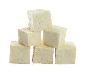 Pieces of delicious tofu on white background. Soybean curd