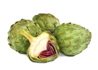 Obraz premium Cut and whole fresh artichokes on white background