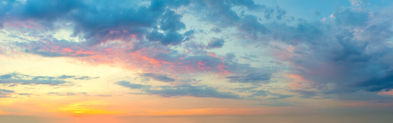 Naklejka na ściany i meble Panoramic view of Sunset Sunrise Sundown Sky with colorful clouds