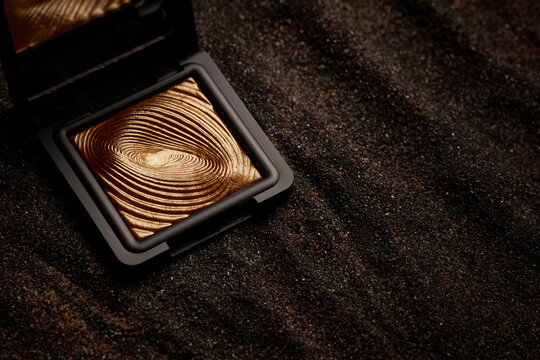 Gold Luxury Eye Shadow On Black And Gold Sand