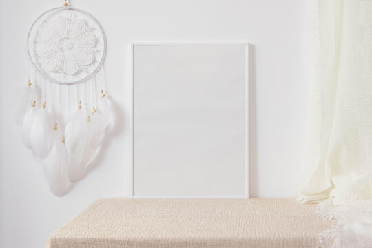 White photo frame mockup with dreamcatcher