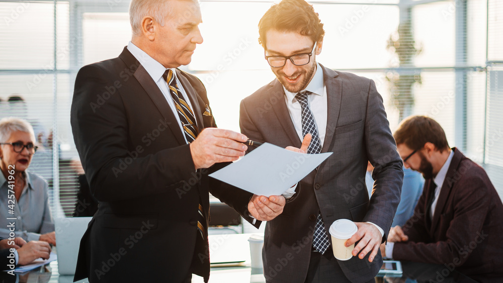 Canvas Prints head and employee discussing a working document