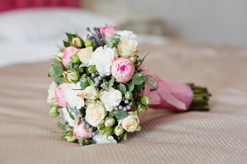 Tender Bride's bouquet with delicate tea roses