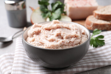 Delicious lard spread in bowl on table