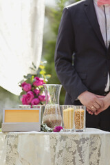 Details of wedding ceremony and tradition of making family amulet from different grain, outdoor....