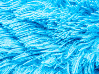 blaues Hochflor Teppich Muster