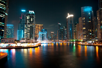 Fototapeta na wymiar Modern building in night light Dubai
