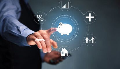 man holding phone with piggy bank icon