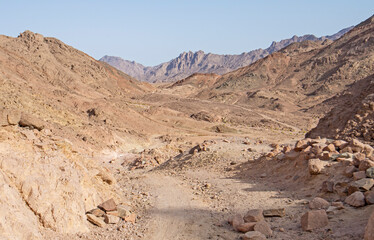 Barren desert landscape in hot climate