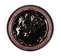 Blackcurrant jam in glass jar, marmalade isolated on white background