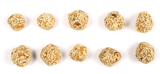 Caramelized hazelnut balls with sesame seeds, dessert set and collection isolated on white background, top view