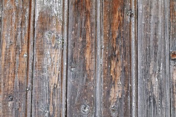 Obraz premium Wall of an old wooden house, background