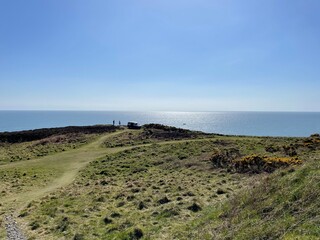 Camper van on the cliffs overlooking the Irish Sea on Marine Drive - Douglas, Isle of Man