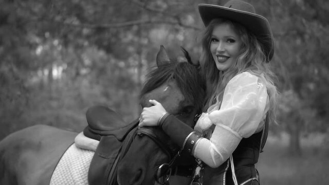 Cowboy girl posing at ranch