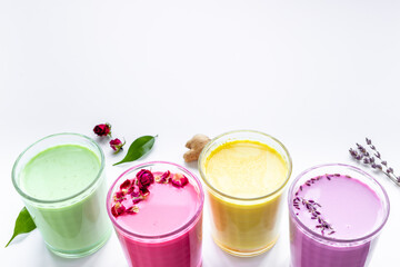 Colorful super latte coffee or tea with turmeric, beetroot and matcha