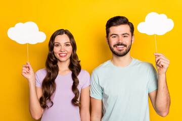 Portrait of attractive cheerful couple holding in hands cloud copy place space new solution...