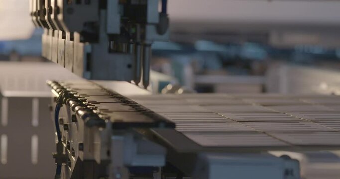 Tabber stringer machine soldering solar cells in a row