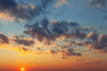 Sunset at red sky . Spectacular evening heaven with clouds