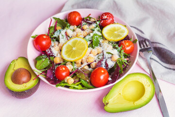 Avocado Salad with Arugula ,Cherry Tomatoes , Baby Spinach, Parmesan and Lemon  .Healthy Food