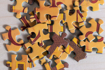 puzzle pieces on a wooden table