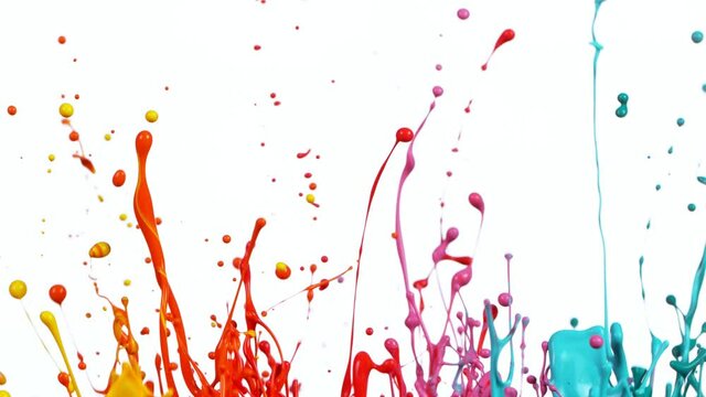 Colorful splashing paint in super slow motion.