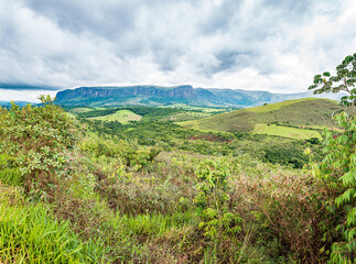 Fototapeta na wymiar Brazilian eco tourism landscape of Minas Gerais state at Serra da Canastra region, at São Roque de Minas city. Far view of the sierra on a cloudy day.