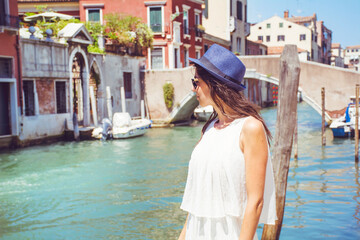 Beautiful Tourist Woman with White Dress  in Venice ,Italy 