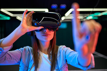 Young woman in virtual reality space